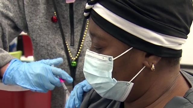Hundreds roll up sleeves for booster shots, including WRAL reporter