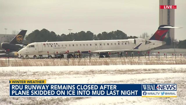 Plane that slid at RDU pulled out from mud, slush 