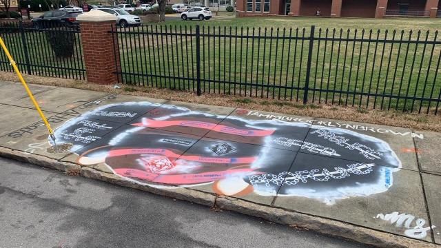 Mural supporting Black lives near Shaw University defaced with markings from white supremacist group 'Patriot Front.'