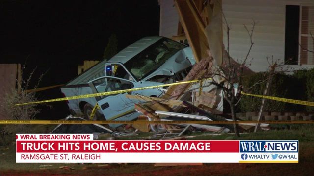 No one hurt as truck crashes into Raleigh home