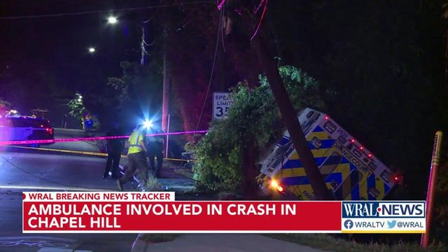Orange County ambulance flips over in crash