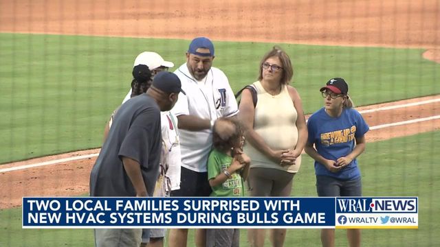 Two local families surprised with new HVAC systems during Durham Bulls game