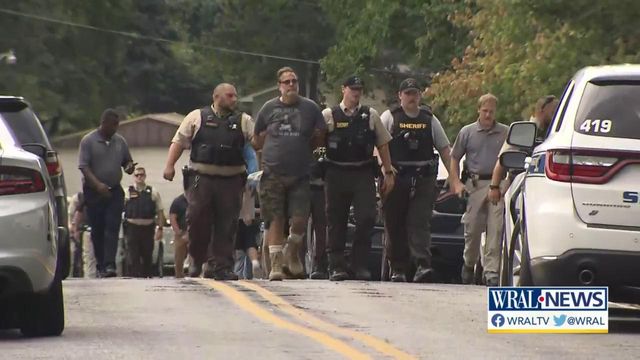 Suspect in handcuffs: Standoff with armed, barricaded man ends after 5 hours