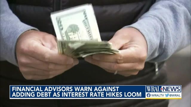 Financial advisors warn against adding debt as interest rate hikes loom