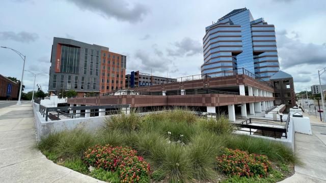 City documentation shows Craig Davis Properties has prepared an unsolicited proposal to purchase the Durham City Centre Parking Deck at 300 West Morgan St. to develop a multi-family residential unit and retail tower. CDP already owned the air rights above the parking deck.