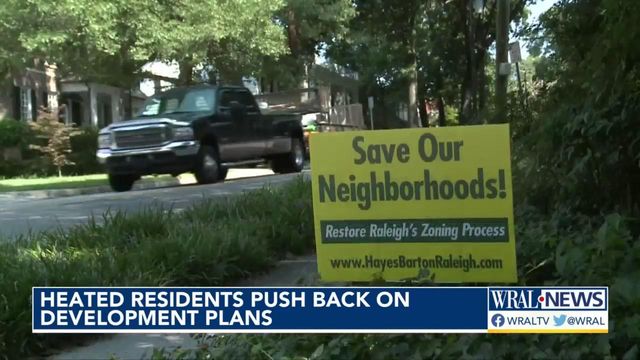 Heated residents push back on development plans 
