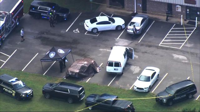 Multiple agencies investigate after dead body found in parked car outside police station in Franklin County
