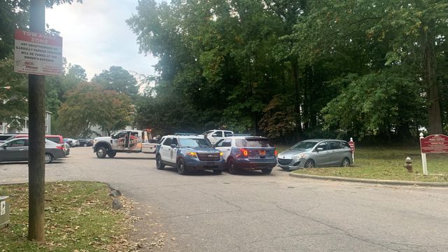 Large police presence at Raleigh townhome complex