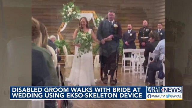 Exoskeleton technology allows injured Marine veteran to walk bride down aisle