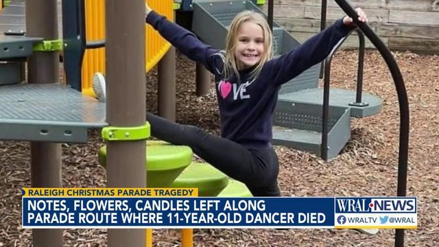 Notes, flowers, candles left along parade route where 11-year-old dancer died