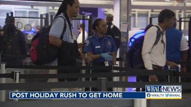 Travelers at RDU rush to get home post-holiday