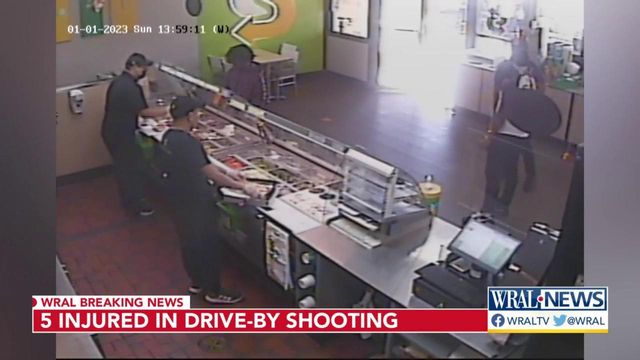 Caught on cam: Employees duck during shooting outside Subway