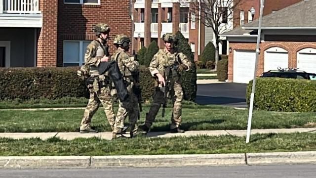 Police surround Cary apartment complex near Walnut Street