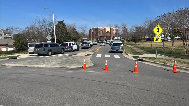Police surround Cary apartment complex near Walnut Street