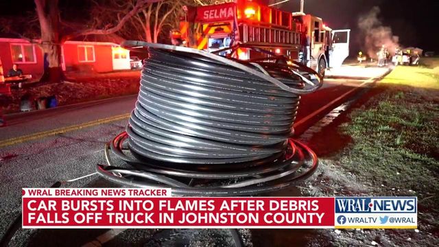 Car burst into flames after debris falls off truck in Johnston County