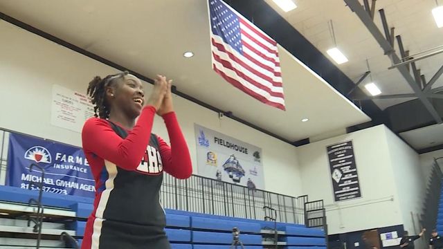 High school's only cheerleader keeps her spirits high
