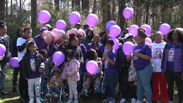 Family, friends remember young mother with balloon release