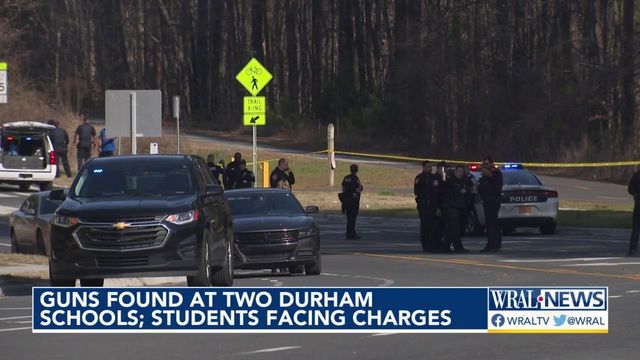 Guns found at two Durham schools, students facing charges