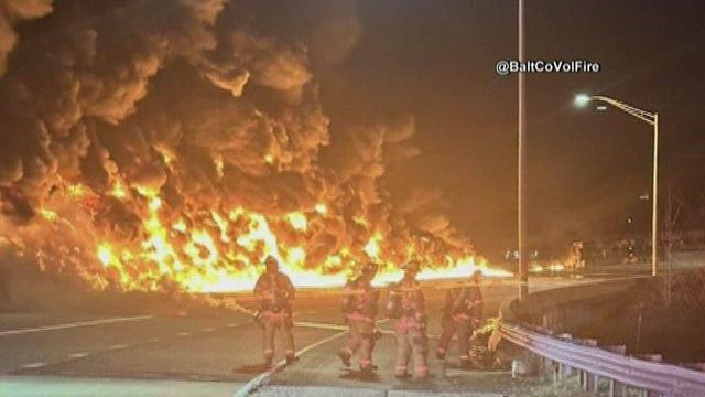 On cam: Tanker overturns, bursts into flames on major highway