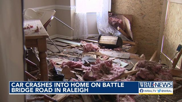 Security footage captures the moment a driver crashes into a family's home in Raleigh 