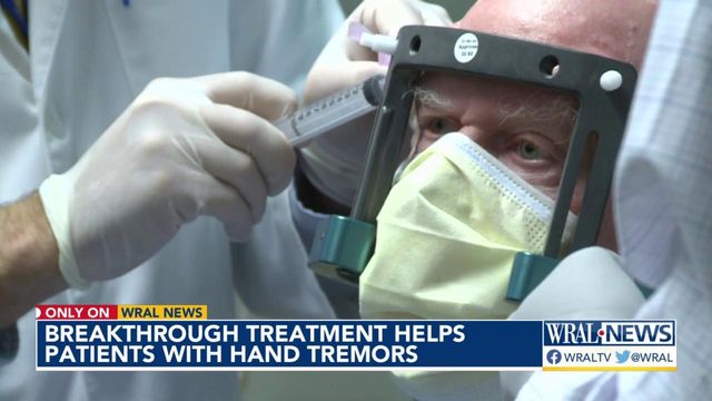 Non-invasive brain treatment eases hand tremors