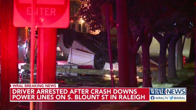 Car overturns, downs power lines in downtown Raleigh crash 