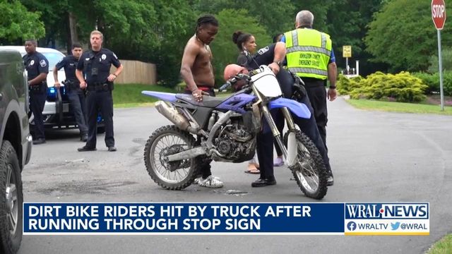 A dirt bike crash has left two teens in the hospital, one of them facing charges 