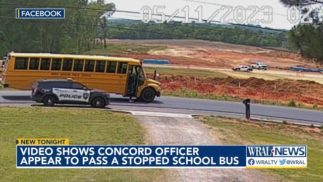 NC officer seen passing stopped school bus 