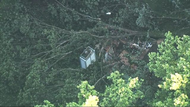 Two people were inside Cary home when tree fell