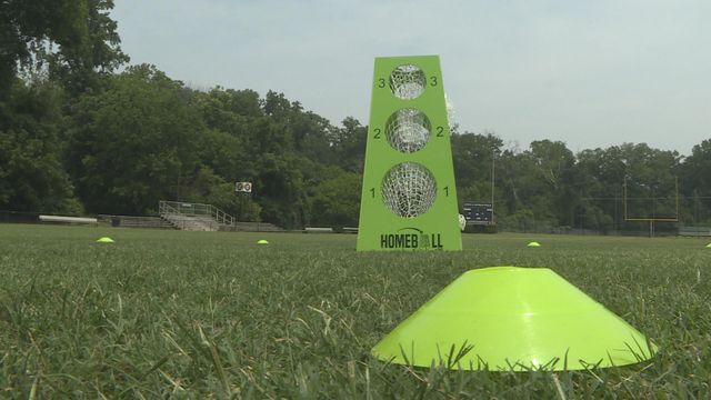 Raleigh teacher invents game that combines basketball, cornhole, football skills