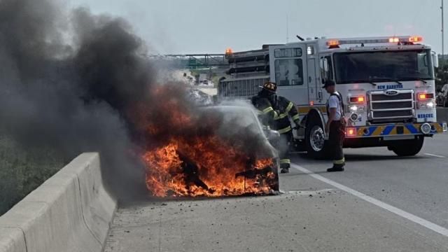 Electric vehicle catches fire after hitting debris on I-140