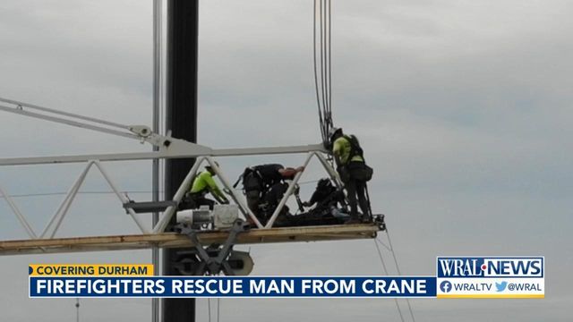 Durham firefighters rescue man from crane