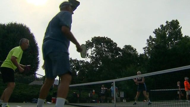 Pickleball coach Joe Borrelli answers questions about the growing popularity of the sport