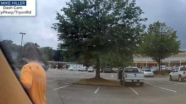 On cam: Car speeds through Cary shopping center