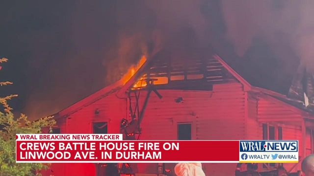 Crews battle house fire on Linwood Ave. in Durham