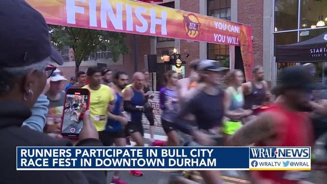 Runners participate in Bull City Race Fest in Downtown Durham