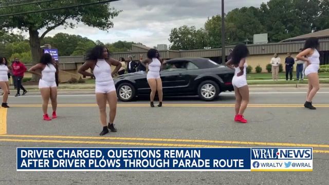 Driver charged, questions remain after driver plows through parade route