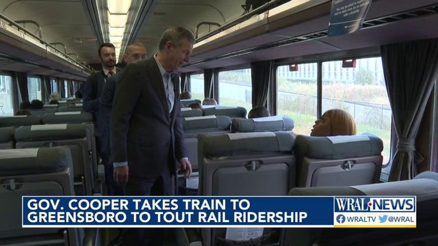 Gov. Cooper takes train to Greensboro to tout rail ridership