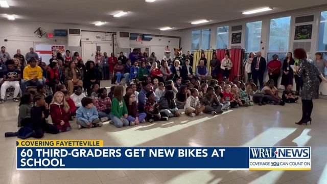 Surprise! Act of kindness sends 60 elementary students home with new bikes