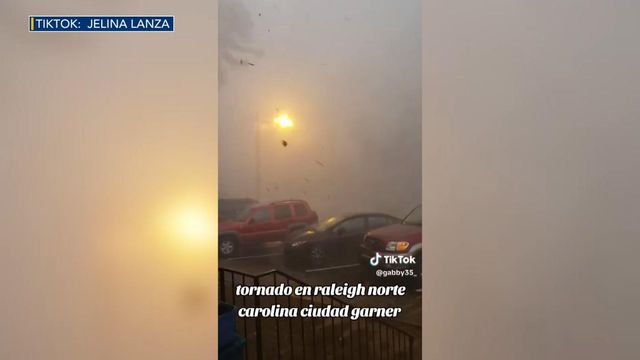 Flame shoots up from utility pole in Garner during storm