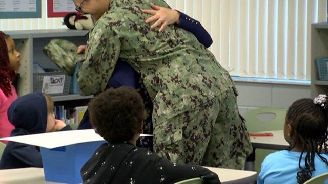 Teacher gets early Christmas present from surprise reunion with son
