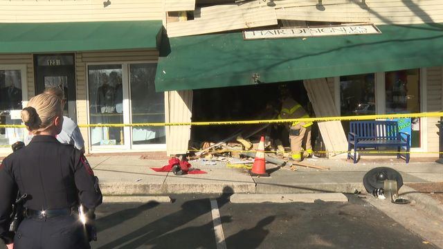 Crews respond to wreckage after SUV crashes into hair salon