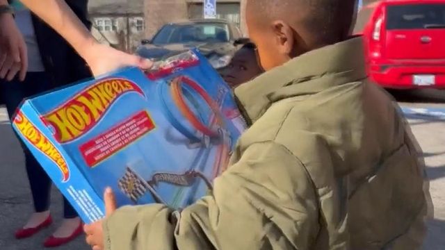 Raleigh firefighters deliver gifts to children