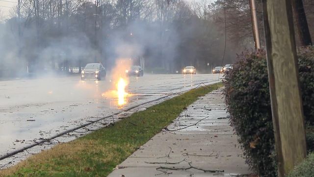 Powerlines sparking on Six Forks Road
