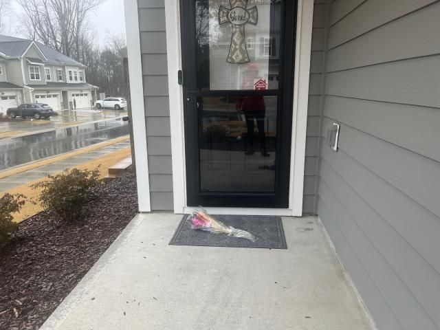 Flowers outside victim's home