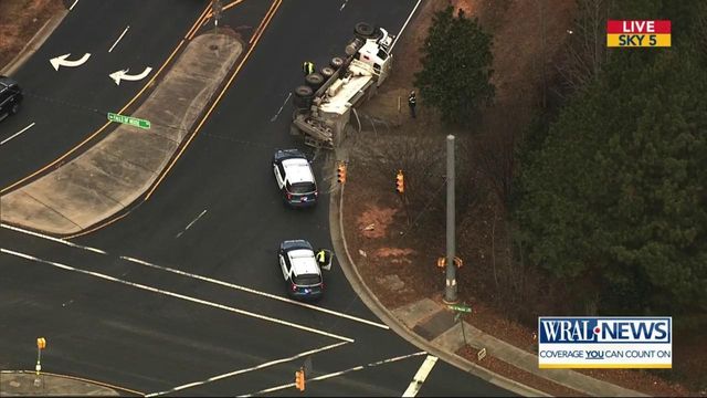 Sky 5 flies over truck that overturned on Falls of Neuse Road