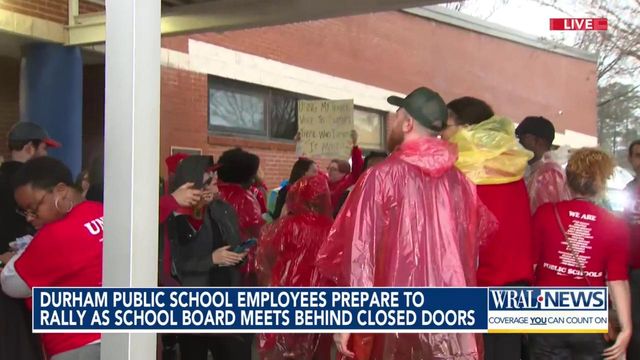 Durham Public School employees prepare to rally as school board meets behind closed doors 