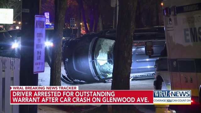 Driver arrested for outstanding warrant after crashing into tree on Glenwood Avenue