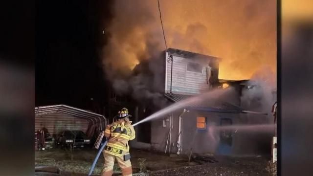 'Total loss:' Tall flames engulf auto shop in Johnston County