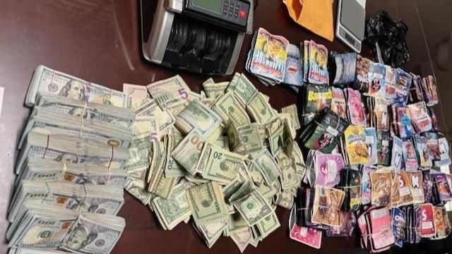 Raleigh police confiscated a pistol, marijuana, codeine, and currency during a weekend investigation. Photo courtesy of the Raleigh Police Department.